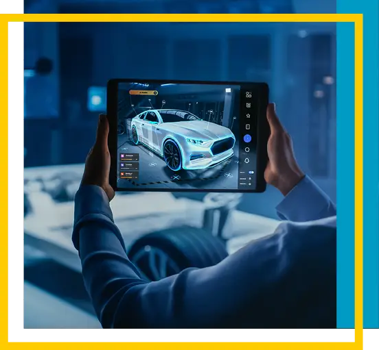 A person holds a tablet displaying a 3D model of a car, with augmented reality features. The real car chassis is faintly visible in the background, in a dimly lit, modern setting. Blue and yellow borders frame the image.