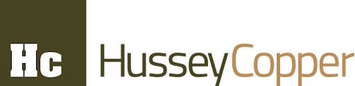 Logo with a green square containing the white letters Hc on the left, and the words Hussey Copper in green and copper-colored text on a white background to the right.
